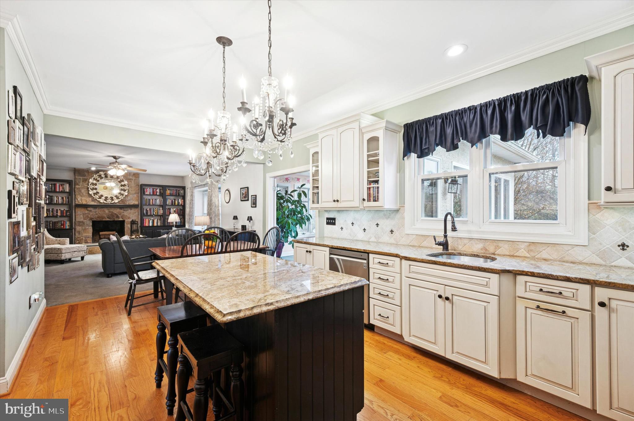 22 Country Run Thornton, PA 19373 - Photo 6 of 32 Timeless upgraded kitchen leading to family room