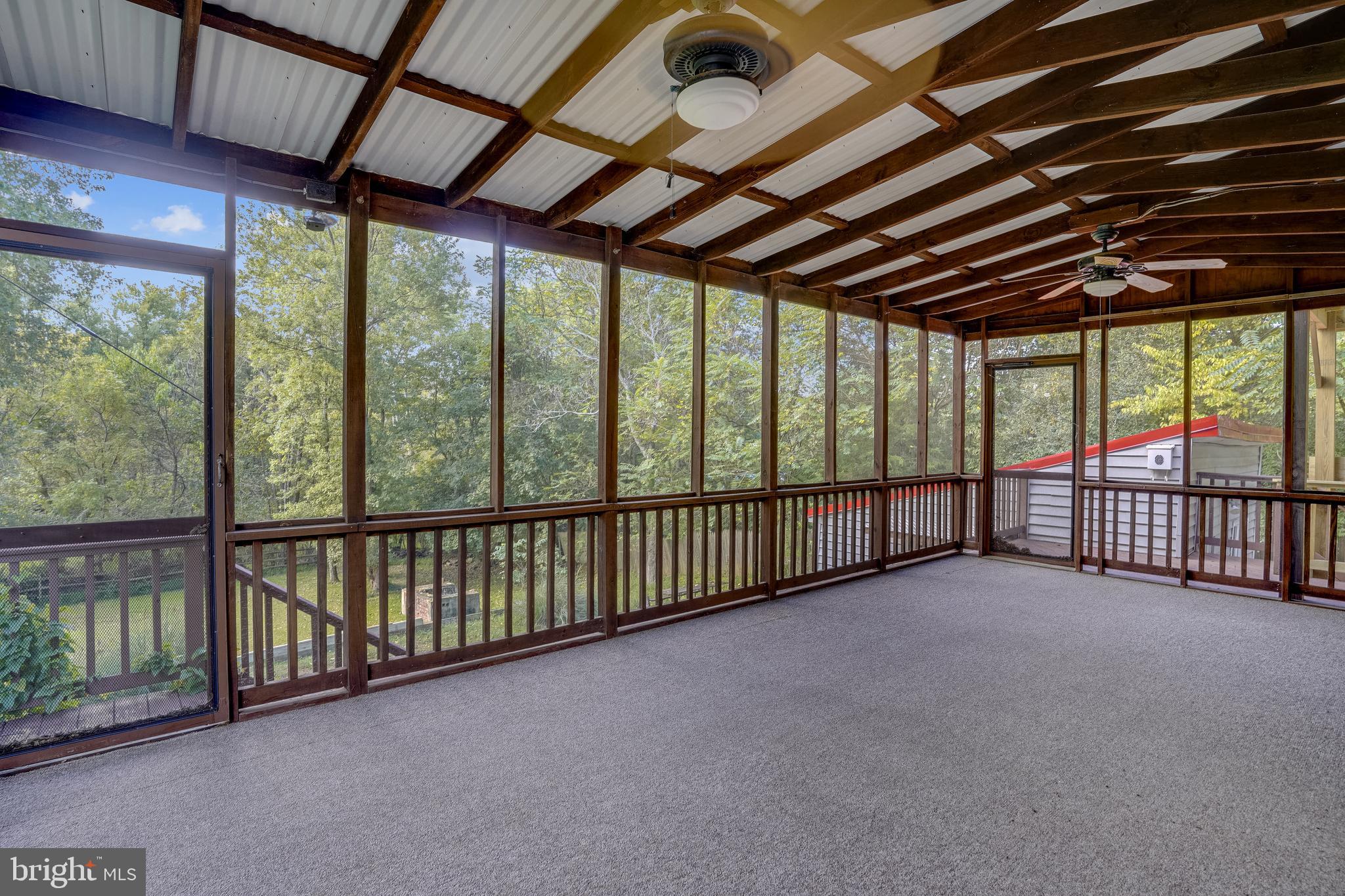 4931 Green Valley Road Monrovia, MD 21770 - Photo 17 of 31 Screened porch