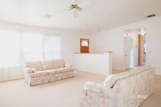 905 Harriet Street Ridgecrest, CA 93555 - Photo 8 of 34 a living room with furniture and a couch