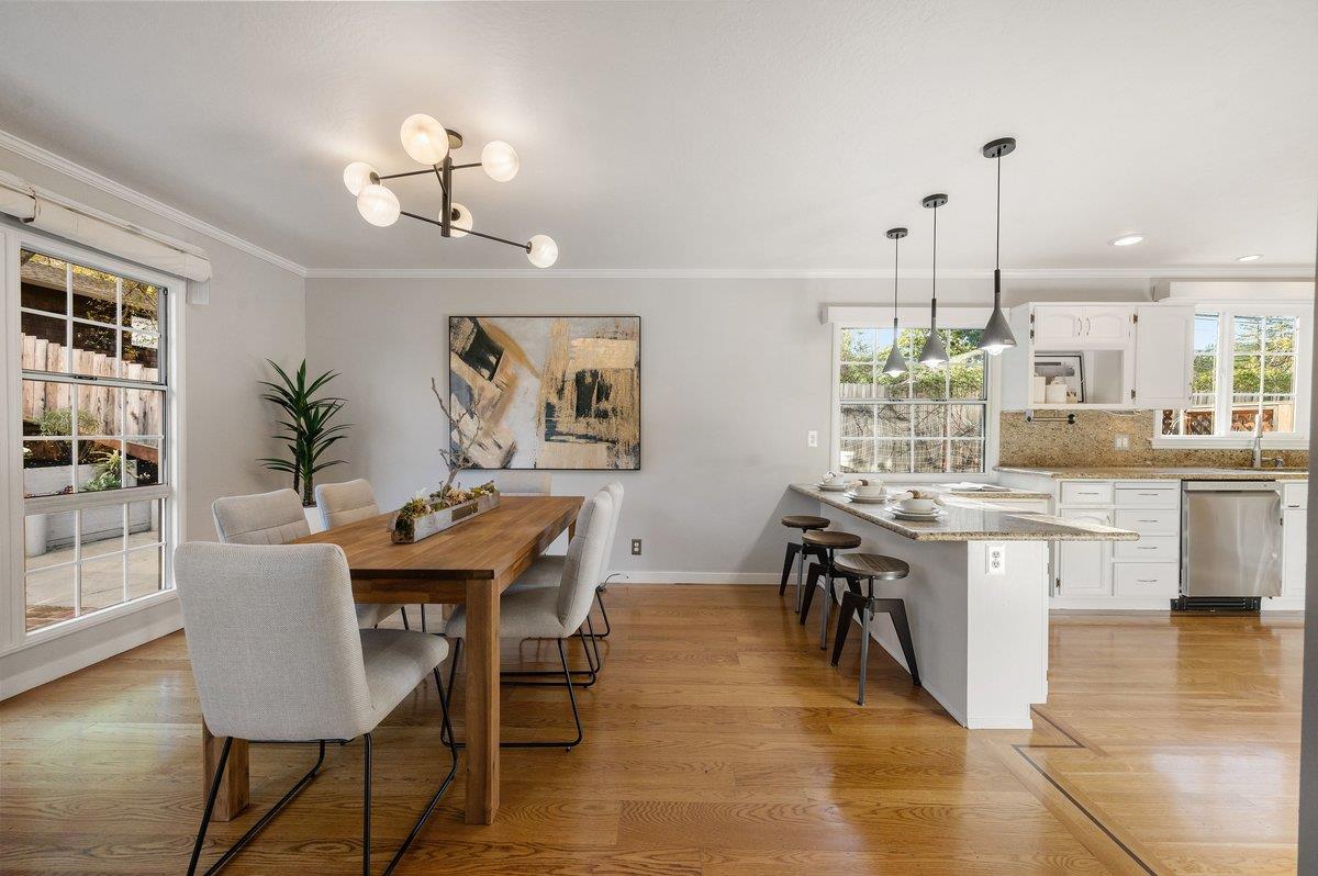 1277 Edgewood Road Redwood City, CA 94062 - Photo 20 of 49 a view of a dining room with furniture window and wooden floor