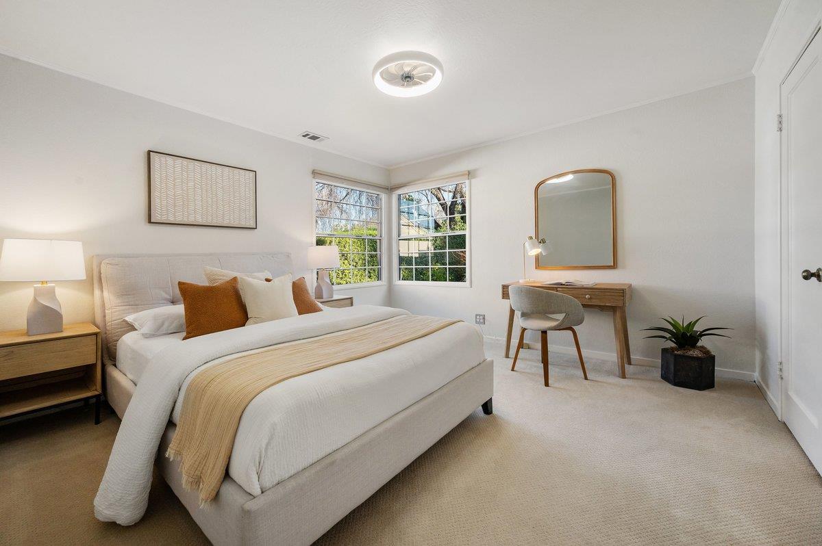 1277 Edgewood Road Redwood City, CA 94062 - Photo 36 of 49 a bed room with a bed and a chair