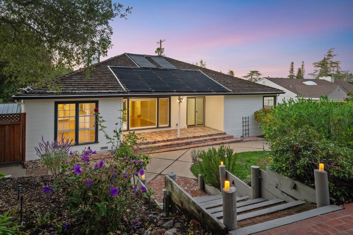 1277 Edgewood Road Redwood City, CA 94062 - Photo 39 of 49 a front view of a house with a yard