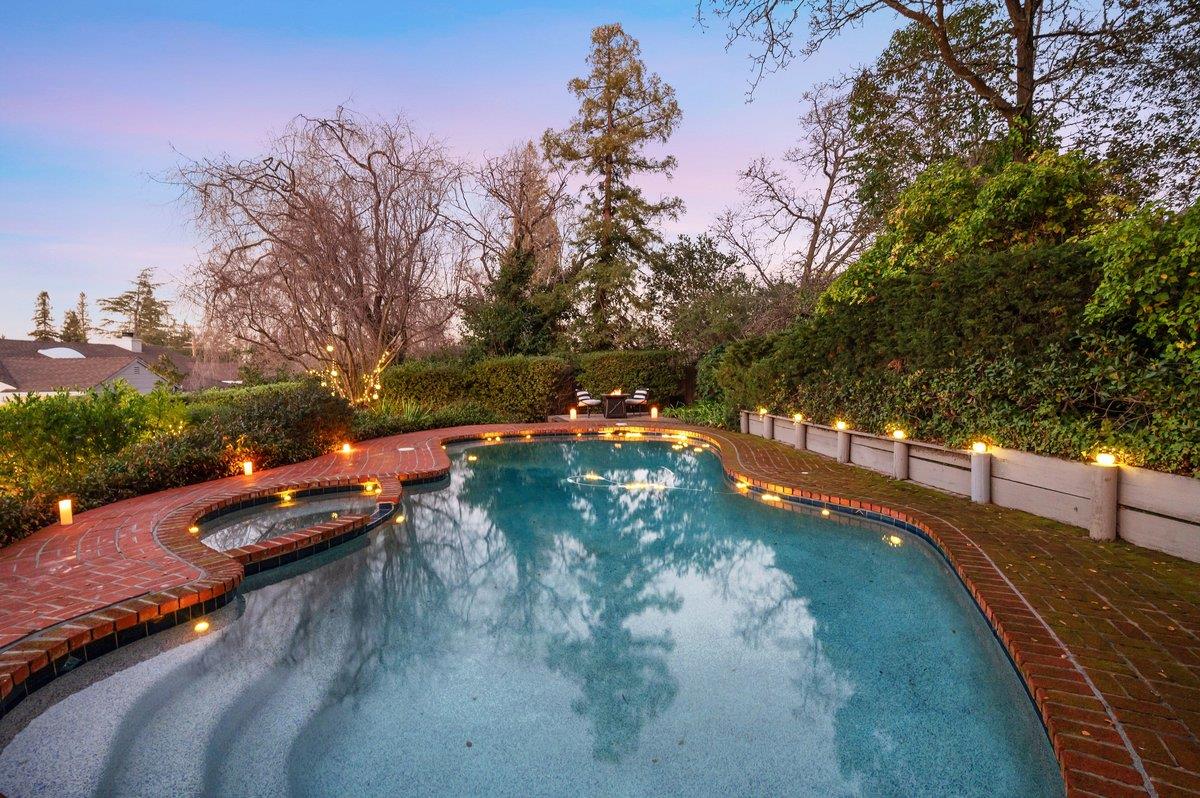 1277 Edgewood Road Redwood City, CA 94062 - Photo 42 of 49 a view of a street with a yard