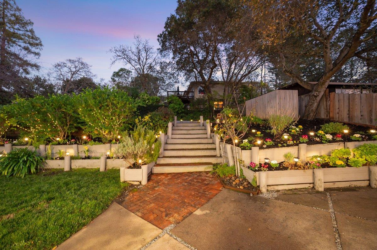 1277 Edgewood Road Redwood City, CA 94062 - Photo 7 of 49 a view of a bench in a garden