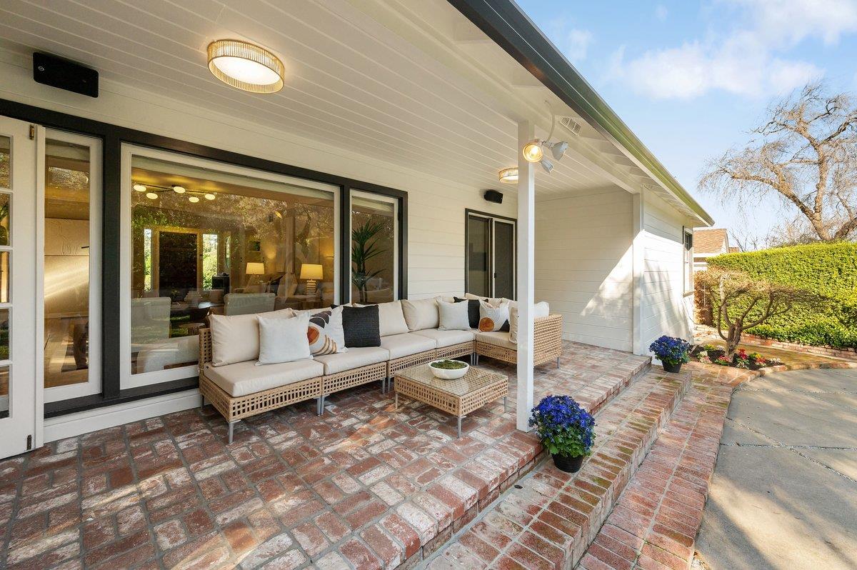 1277 Edgewood Road Redwood City, CA 94062 - Photo 9 of 49 a living room with furniture and wooden floor