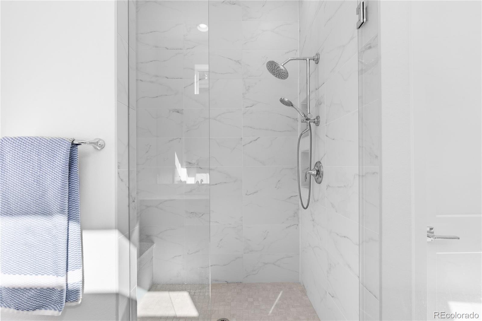 6610 Fawn Path Lane Castle Pines, CO 80108 - Photo 30 of 50 a bathroom with a shower