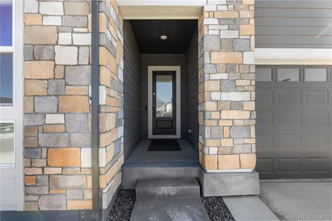 a front view of a house with a shower