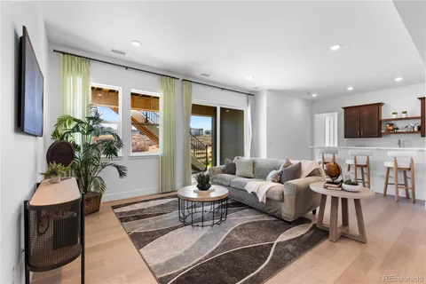 a kitchen with a table and chairs in it