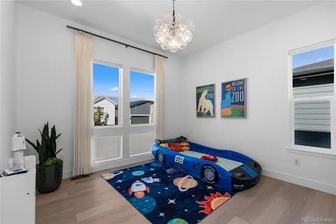 a room with toys and wooden floor