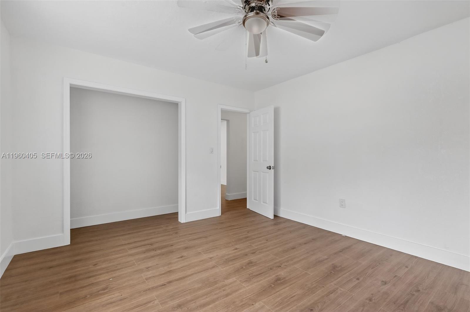 280 Northwest 34th Street Miami, FL 33127 - Photo 14 of 34 wooden floor in an empty room