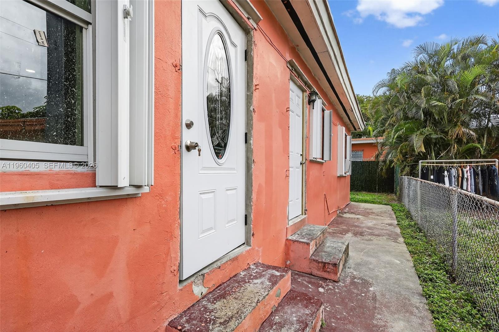 280 Northwest 34th Street Miami, FL 33127 - Photo 34 of 34 a front view of a house with a yard