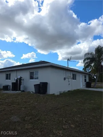 a house view with a garden space