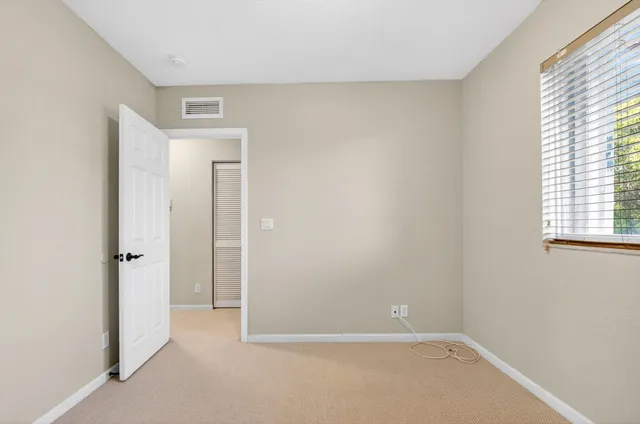 a view of swimming pool from a balcony
