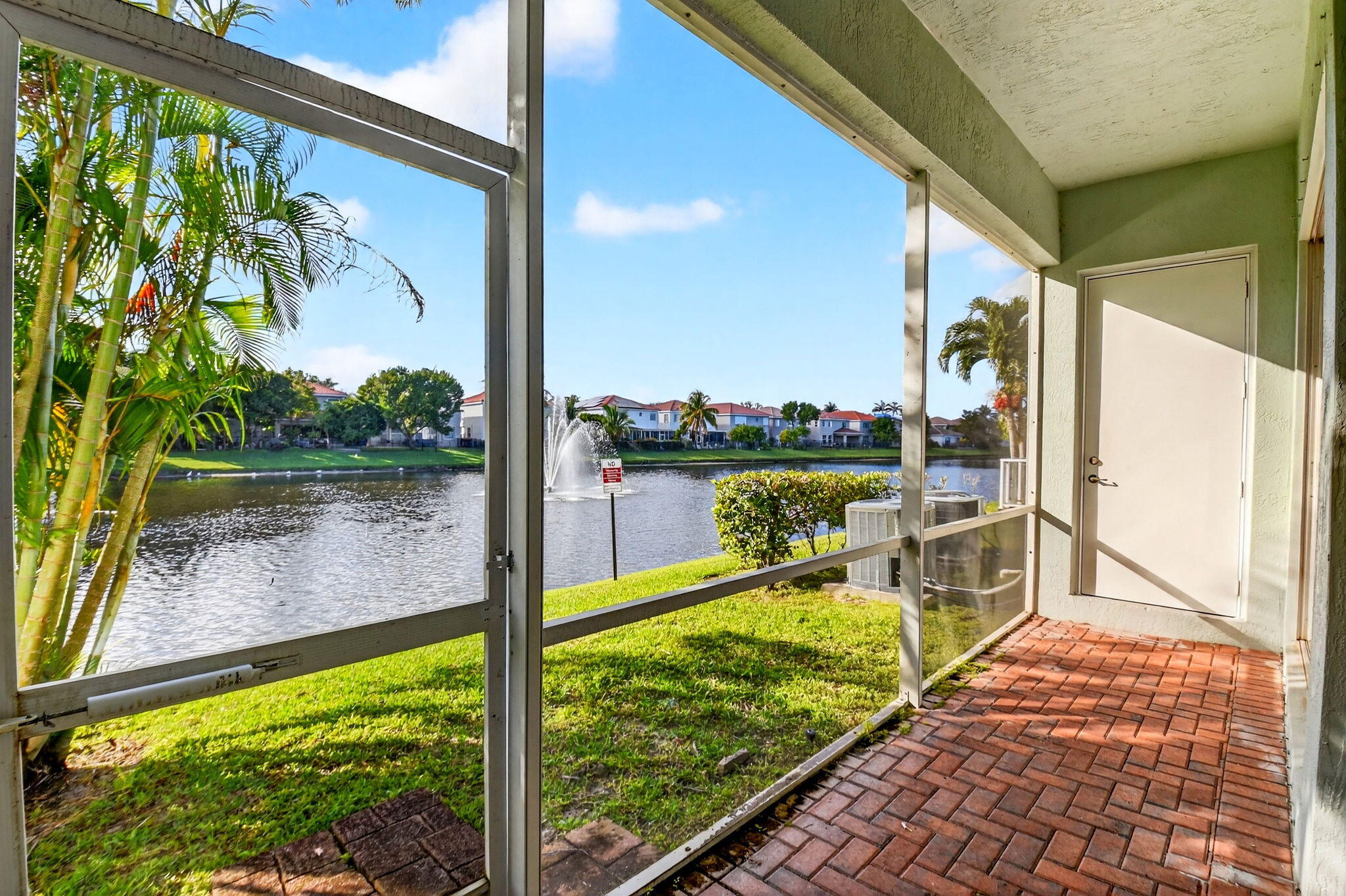 2138 Oakmont Drive Riviera Beach, FL 33404 - Photo 39 of 59 Screened-in patio