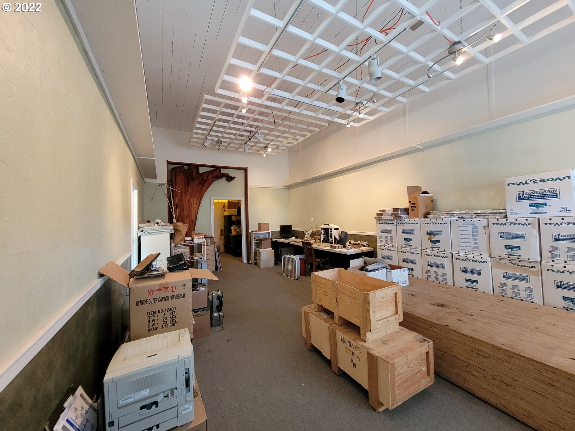 246 6th Street Port Orford, OR 97465 - Photo 22 of 34 a living room with furniture and a chandelier