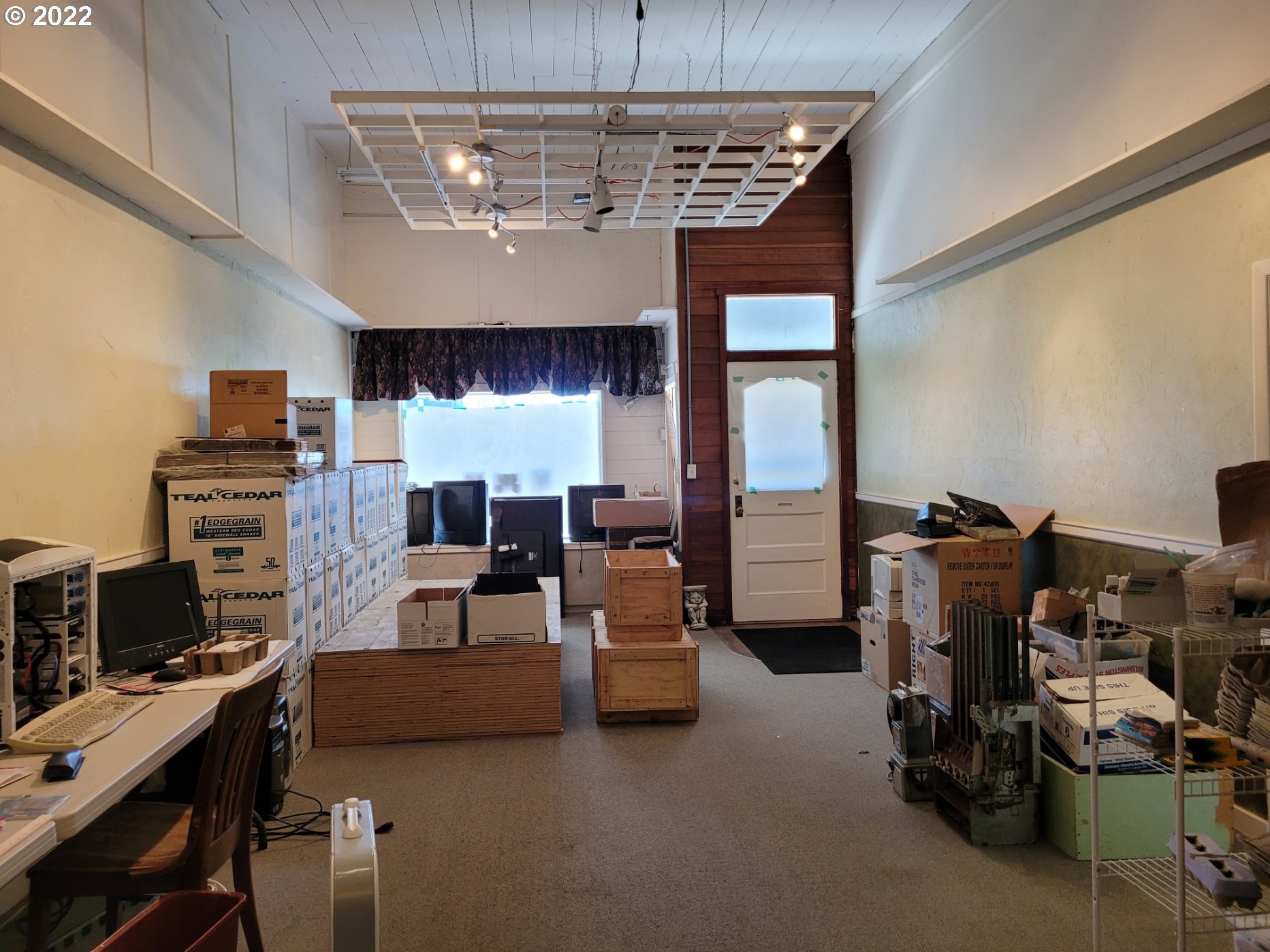246 6th Street Port Orford, OR 97465 - Photo 29 of 34 a view of a livingroom with furniture and a chandelier