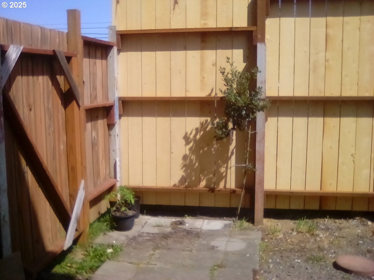 246 6th Street Port Orford, OR 97465 - Photo 32 of 34 a view of a utility room with a window