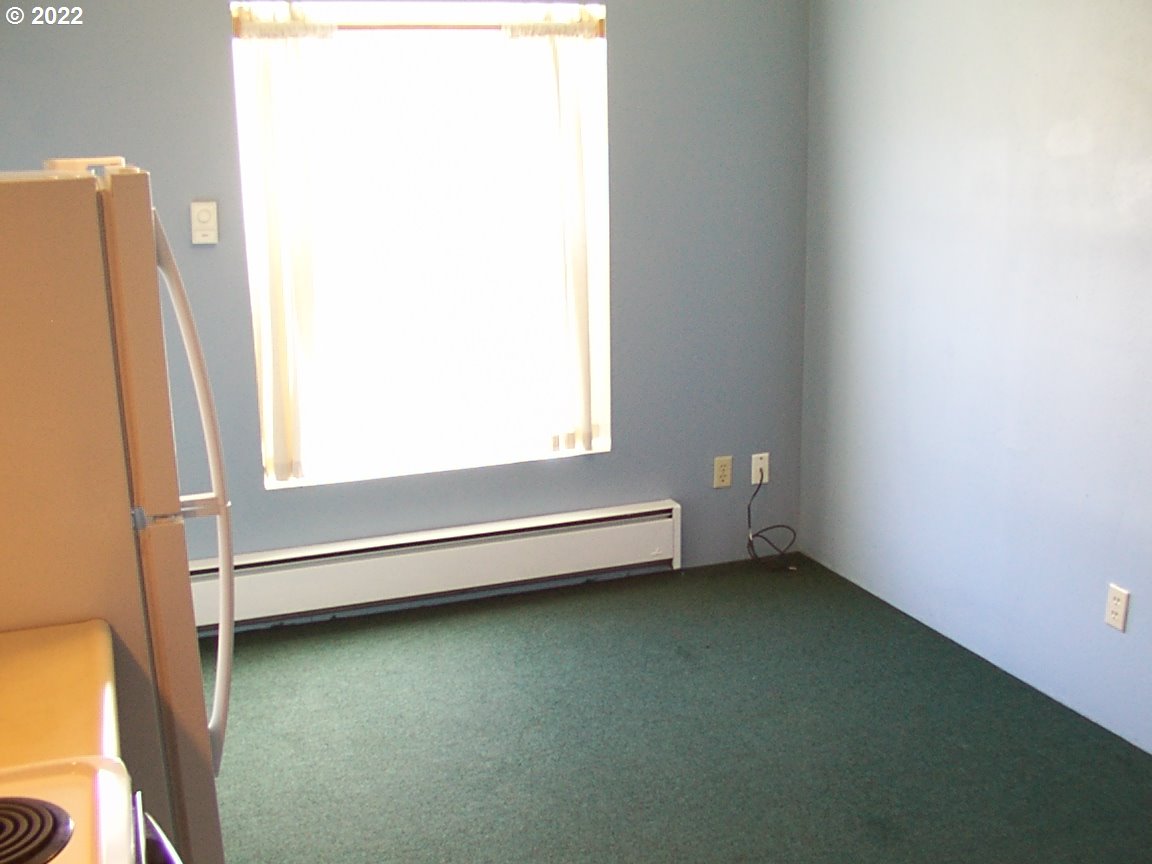246 6th Street Port Orford, OR 97465 - Photo 8 of 34 a view of a room with window