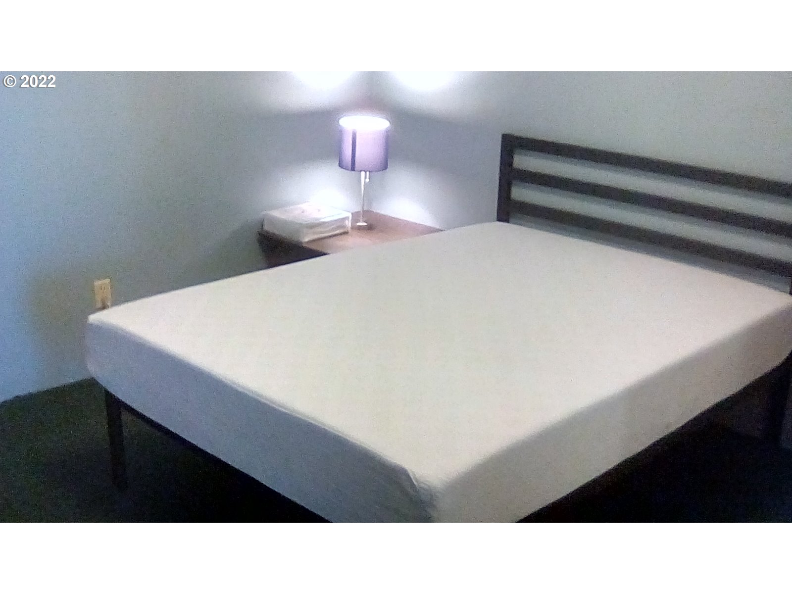 246 6th Street Port Orford, OR 97465 - Photo 10 of 34 a black and white photo of a room