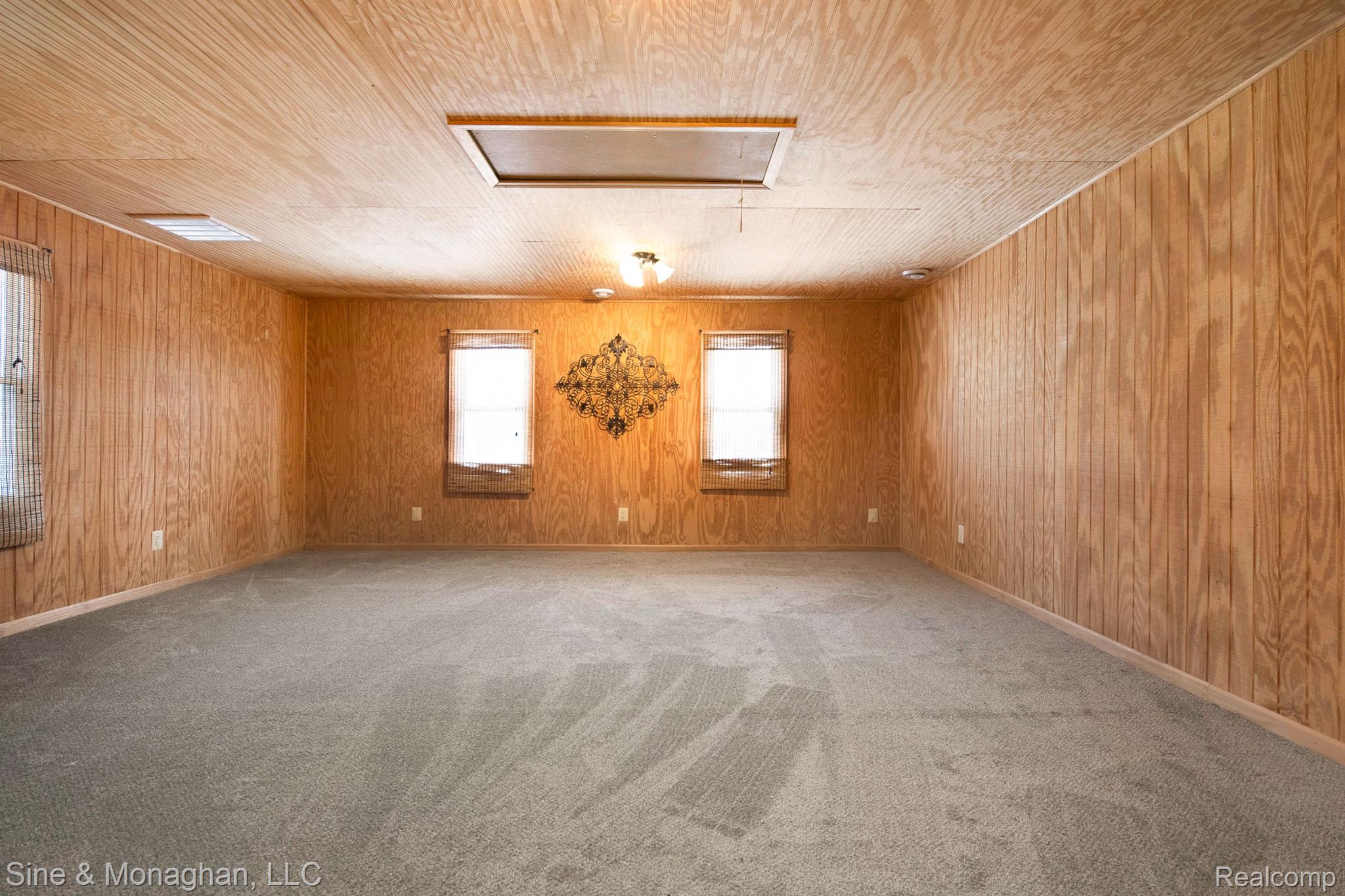 6135 North Genesee Road Flint, MI 48506 - Photo 19 of 45 Large family room with separate heating