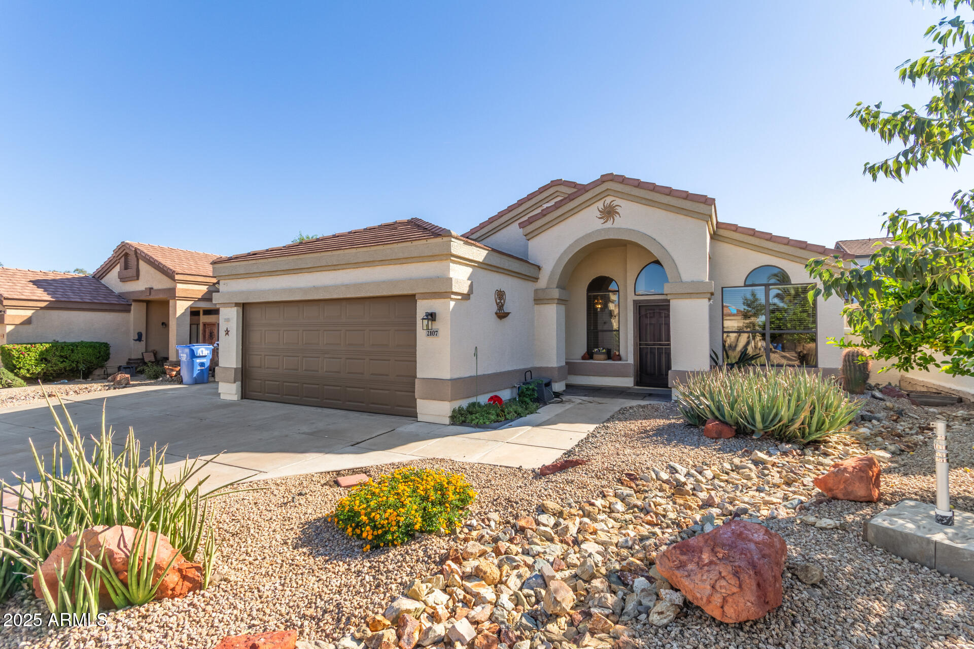 2107 East Marco Polo Road Phoenix, AZ 85024 - Photo 1 of 36 a view of a house with a yard