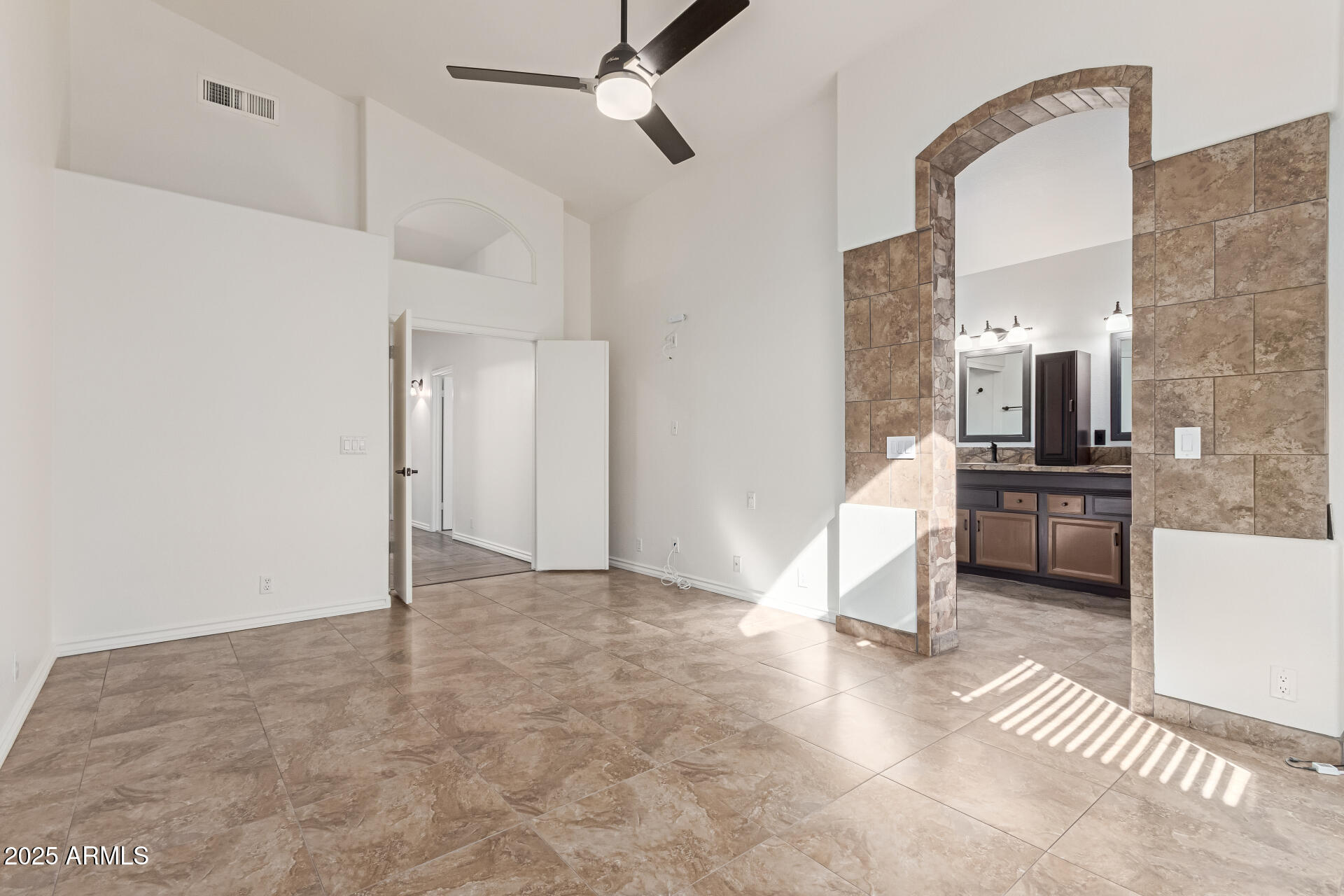 2107 East Marco Polo Road Phoenix, AZ 85024 - Photo 15 of 36 a view of a kitchen with a sink and a stove top oven