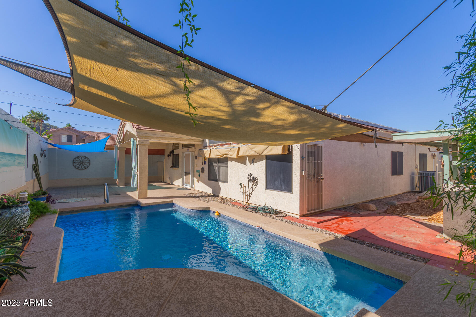 2107 East Marco Polo Road Phoenix, AZ 85024 - Photo 32 of 36 a view of a house with backyard and sitting area