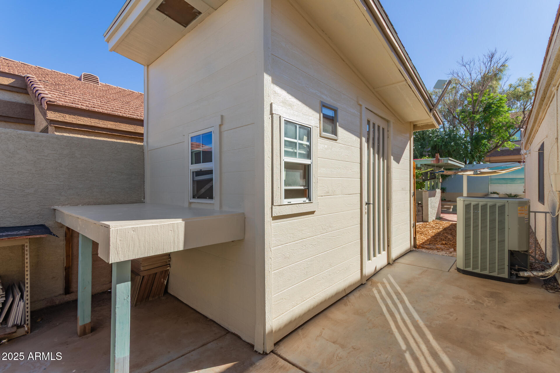 2107 East Marco Polo Road Phoenix, AZ 85024 - Photo 33 of 36 a view of a house with backyard and sitting area
