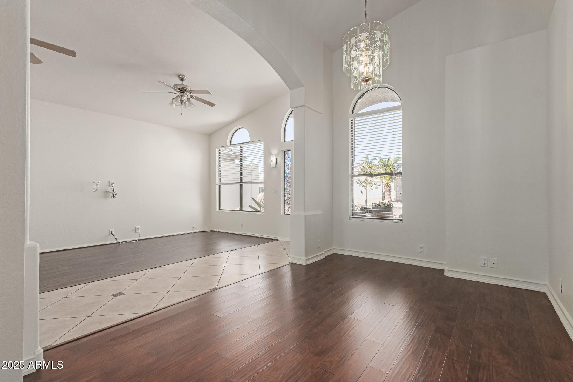 2107 East Marco Polo Road Phoenix, AZ 85024 - Photo 6 of 36 wooden floor in an empty room with a window