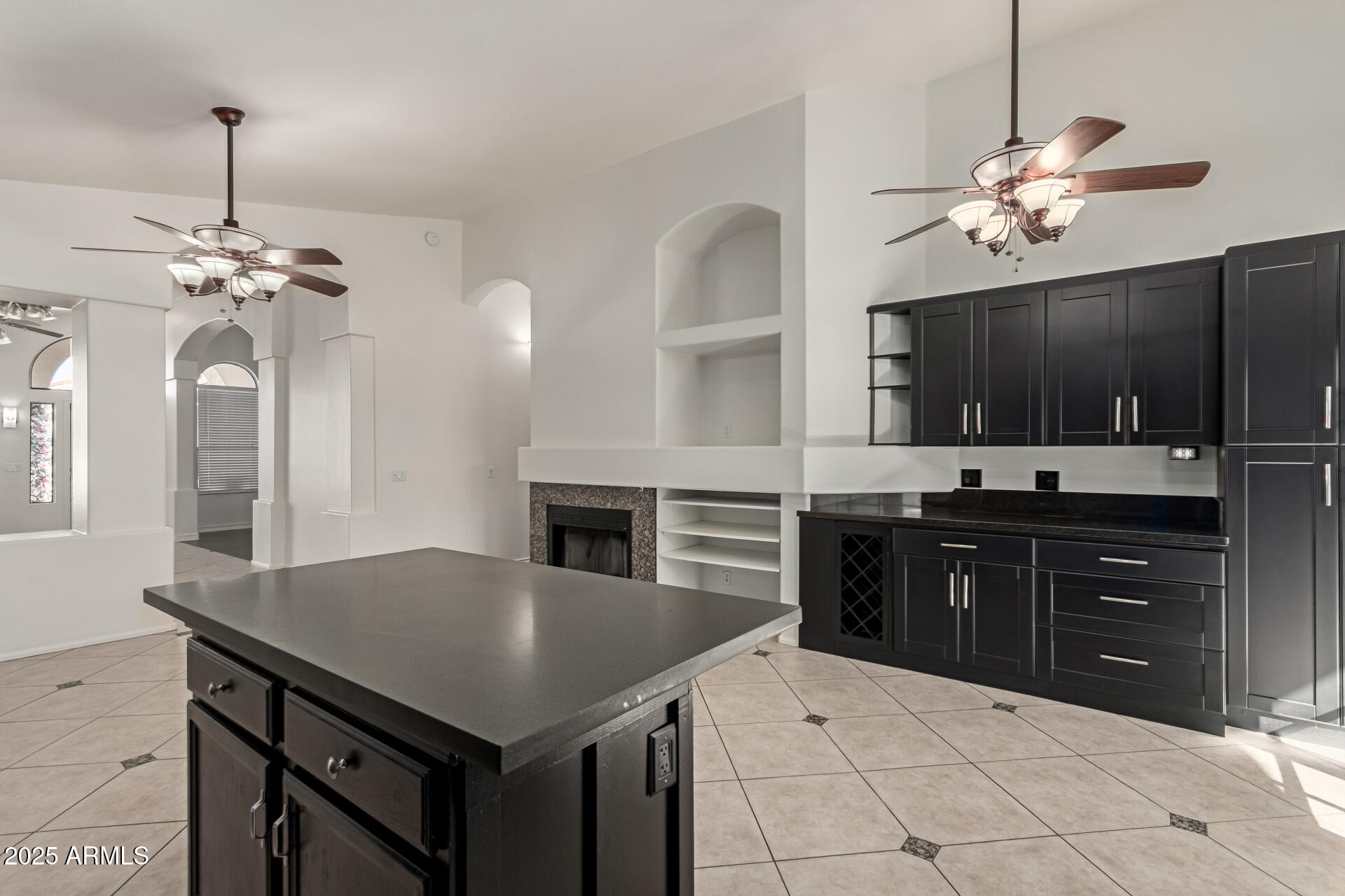 2107 East Marco Polo Road Phoenix, AZ 85024 - Photo 10 of 36 a kitchen with a kitchen island and stainless steel appliances