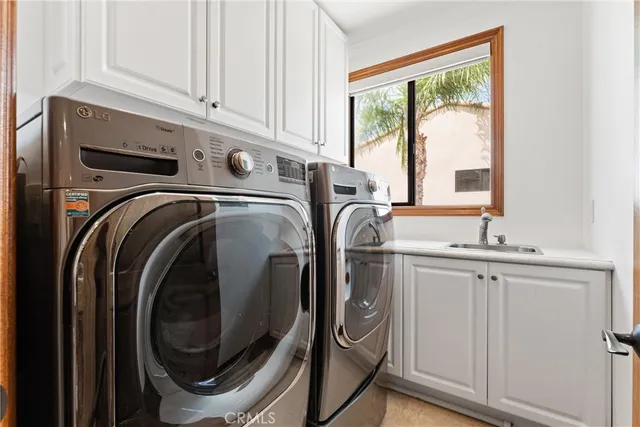 an aerial view of building with an outdoor space