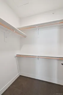 a view of an empty walk in closet