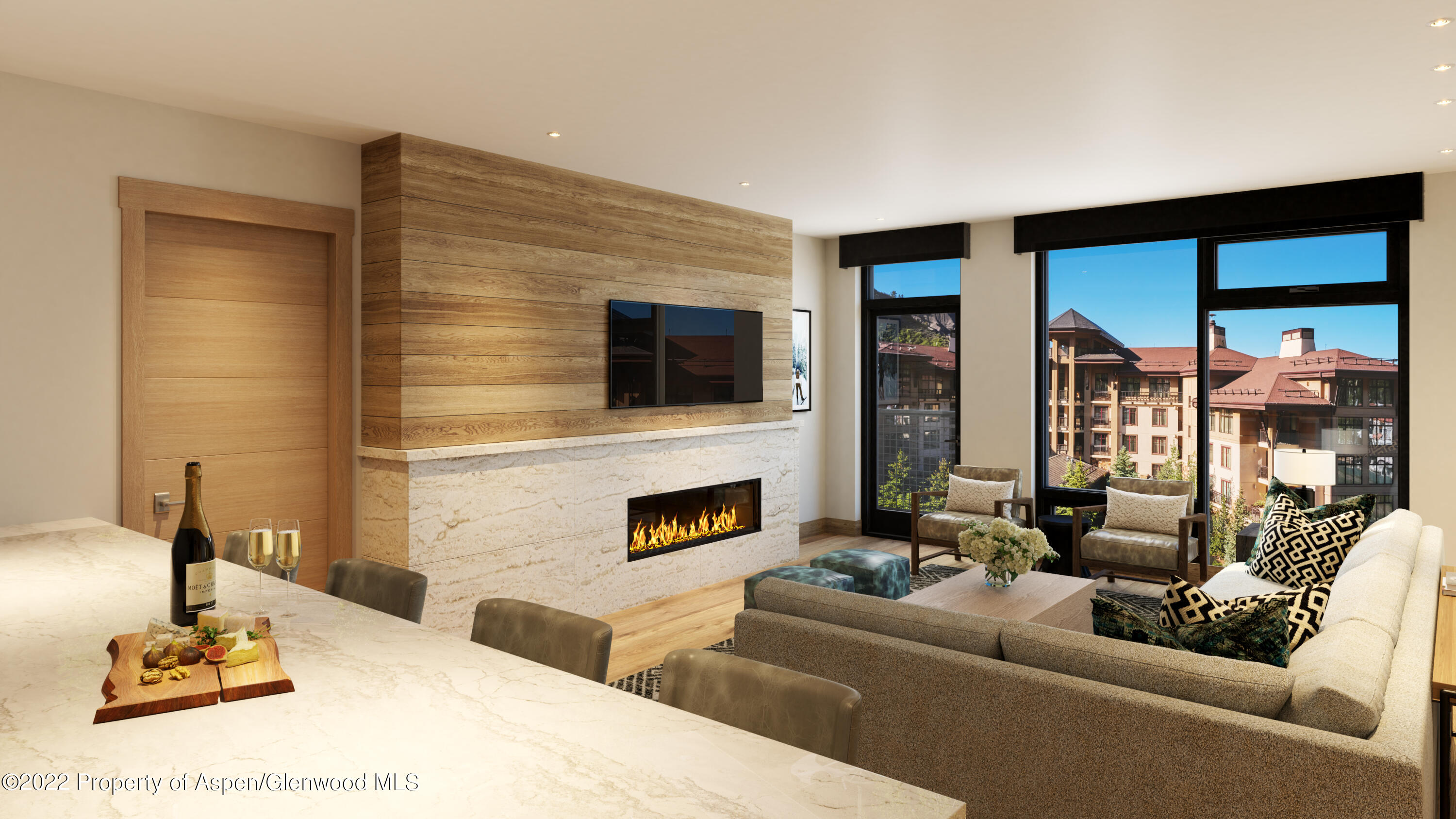 130 Wood Road, Unit 261263 Snowmass Village, CO 81615 - Photo 1 of 7 a living room with furniture and a fireplace
