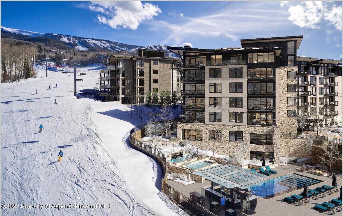 130 Wood Road, Unit 261263 Snowmass Village, CO 81615 - Photo 2 of 7 a view of dinning table and chairs in patio