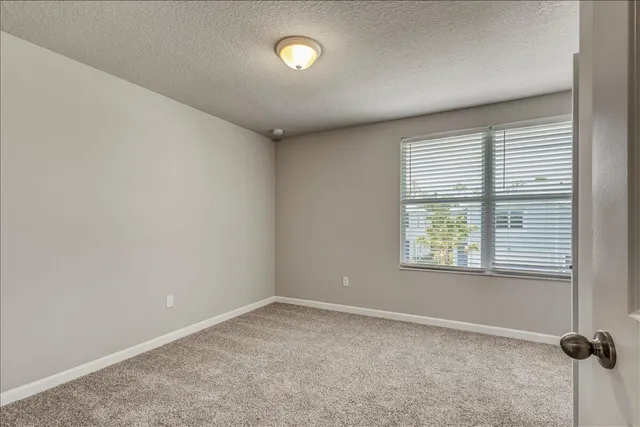 a view of a bathroom with a toilet