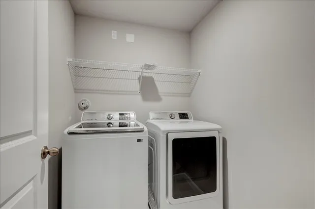 a view of a room with rack on the wall