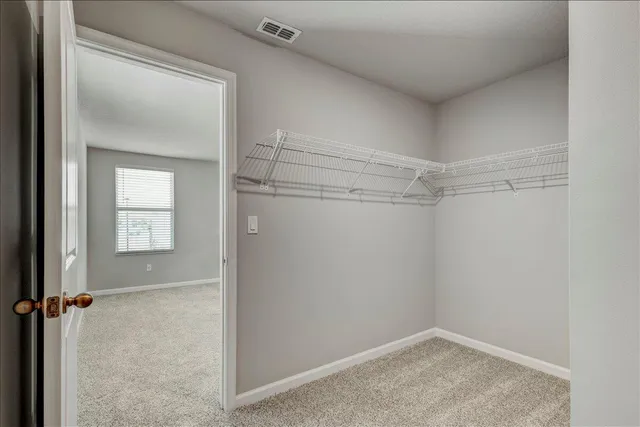 a bathroom with a double vanity sink mirror and double