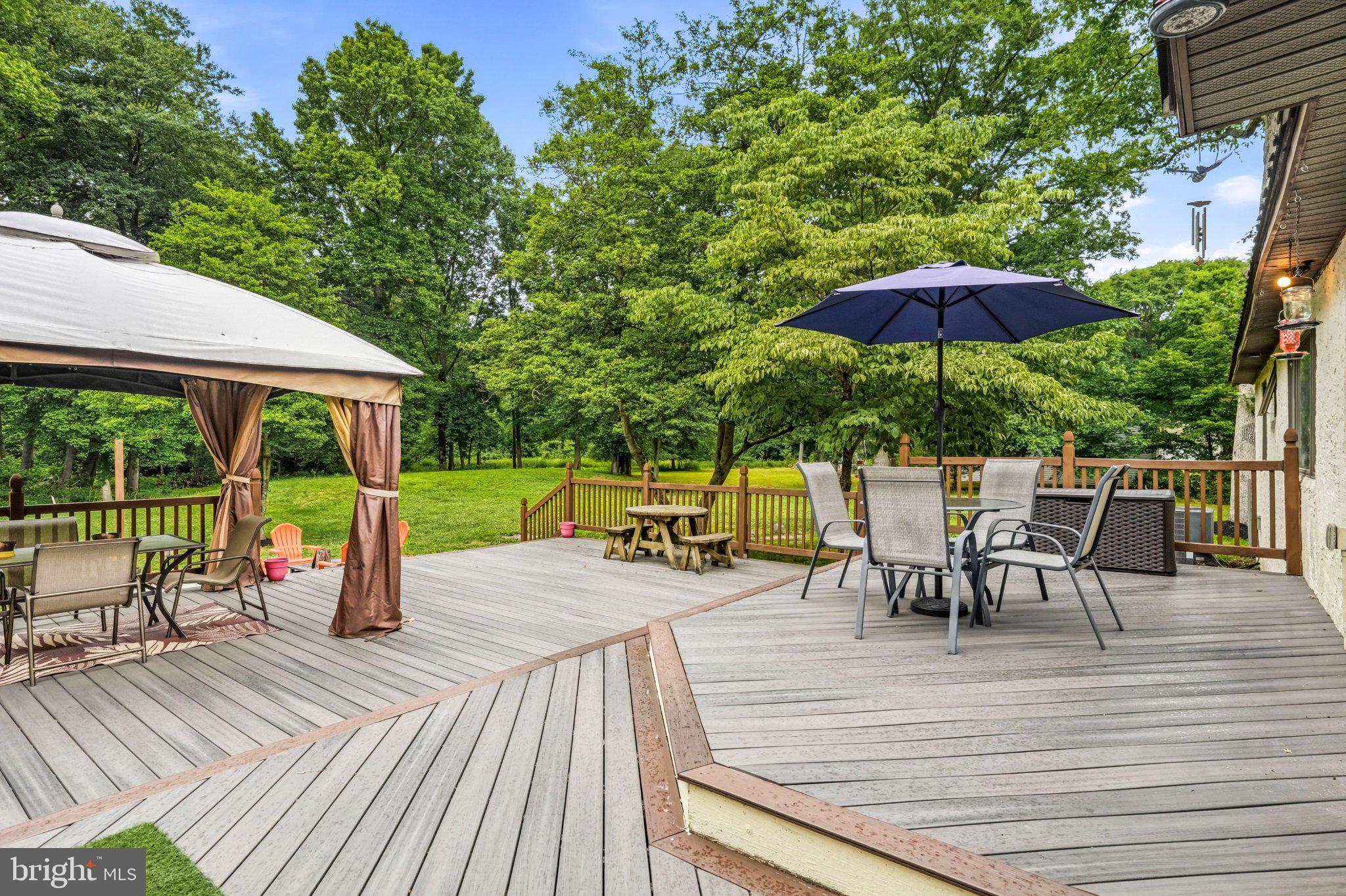 97 Skeet Road Medford, NJ 08055 - Photo 39 of 41 Serene outdoor retreat with lush greenery.