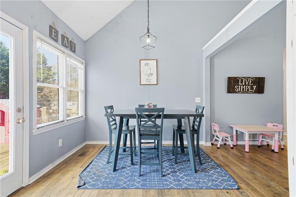 13 Timberline Drive Jasper, GA 30143 - Photo 13 of 39 a view of a dining room with furniture and wooden floor