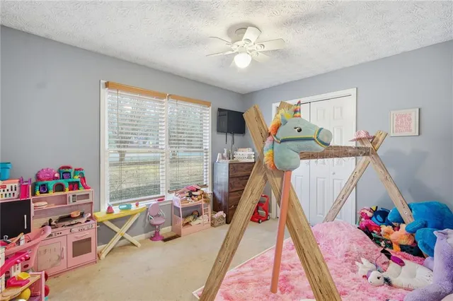 a room with toys and wooden floor