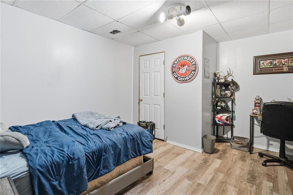 13 Timberline Drive Jasper, GA 30143 - Photo 27 of 39 a bedroom with bed and a table