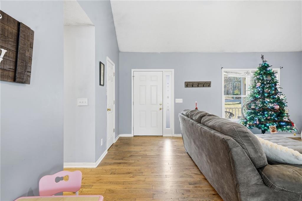 13 Timberline Drive Jasper, GA 30143 - Photo 7 of 39 a living room with furniture and a potted plant