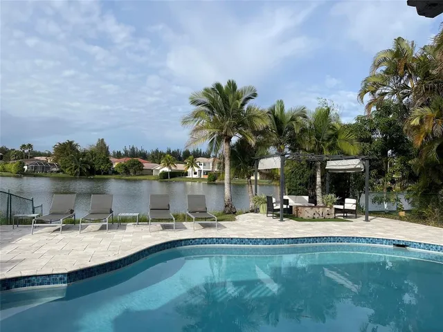 a view of a lake with a building in the background