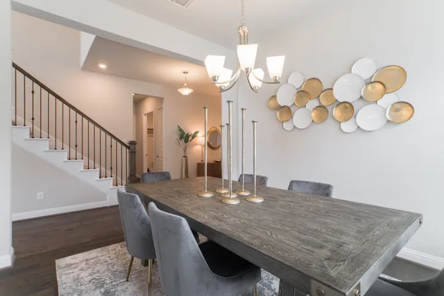 a dining room with wooden floor