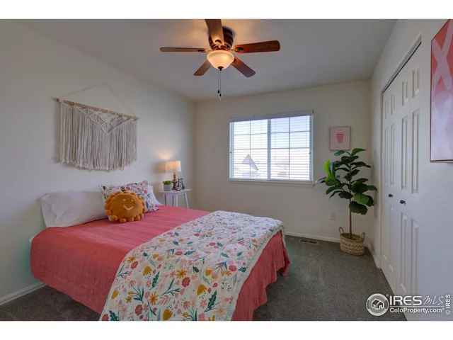 a bathroom with a sink toilet and mirror