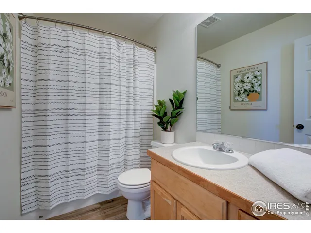 a view of a room with windows