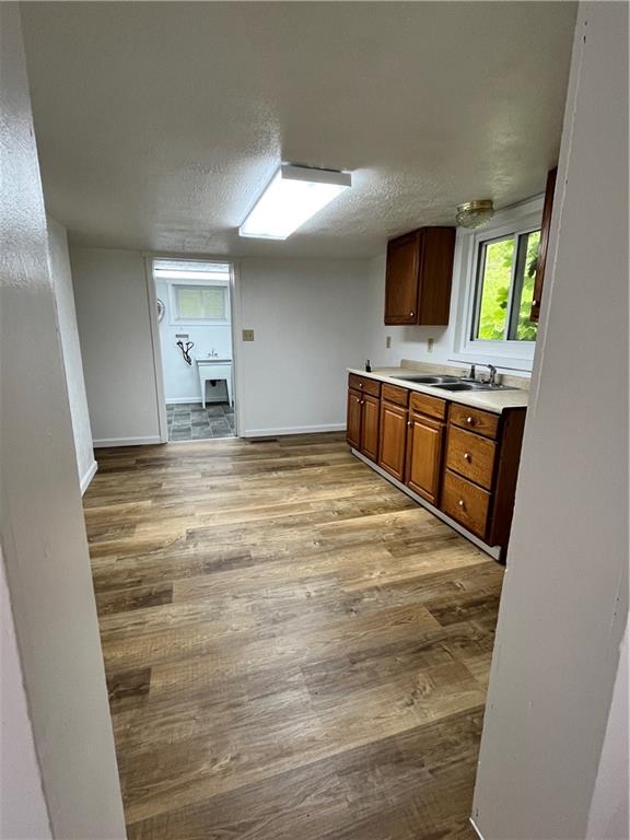 311 Lowell Street Vandergrift, PA 15690 - Photo 5 of 21 a bedroom with a bed and flat screen tv
