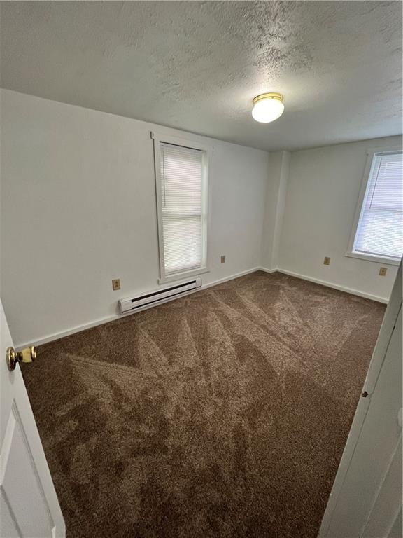 311 Lowell Street Vandergrift, PA 15690 - Photo 9 of 21 an empty room with windows