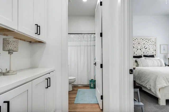 a en suite bathroom with a sink and a mirror