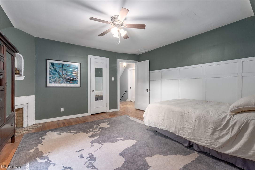 2482 Charney Road Cleveland, OH 44118 - Photo 17 of 34 Hardwood floored bedroom with ceiling fan